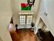 Welcoming entryway with a double door entry, hardwood floors and high ceilings at 1055 Havenstone Walk, Lawrenceville, GA 30045