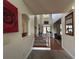 Bright foyer featuring a staircase, hardwood floors, and access to a living area with a large picture window at 1055 Havenstone Walk, Lawrenceville, GA 30045