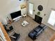 Bright living room with a fireplace, modern furniture, and high ceilings at 1055 Havenstone Walk, Lawrenceville, GA 30045