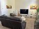 A cozy living room with comfortable seating and modern decor at 1055 Havenstone Walk, Lawrenceville, GA 30045