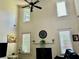 A grand living room with soaring ceilings and a fireplace at 1055 Havenstone Walk, Lawrenceville, GA 30045