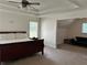 Spacious main bedroom featuring a bonus room, tray ceilings and lots of natural light at 1055 Havenstone Walk, Lawrenceville, GA 30045