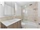 Bright bathroom with a shower over tub, a large mirror, and modern fixtures at 145 15Th Ne St # 1209, Atlanta, GA 30309