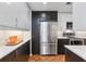 Contemporary kitchen with stainless steel refrigerator and custom cabinetry at 145 15Th Ne St # 1209, Atlanta, GA 30309