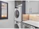 Convenient laundry area integrated into the modern kitchen at 145 15Th Ne St # 1209, Atlanta, GA 30309