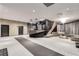 Building lobby featuring elevators, a modern reception desk, stylish seating, and neutral tile floors at 145 15Th Ne St # 1209, Atlanta, GA 30309