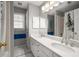 Bright bathroom featuring double sink vanity, a large mirror, and white cabinets at 1490 Rivershyre Pkwy, Lawrenceville, GA 30043