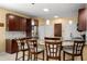 Well-appointed kitchen features stainless steel appliances, granite countertops, and custom cabinets at 1490 Rivershyre Pkwy, Lawrenceville, GA 30043