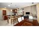Modern kitchen offers a breakfast bar, stainless appliances, and seamlessly opens to the living area at 1490 Rivershyre Pkwy, Lawrenceville, GA 30043