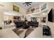 Spacious living room featuring an open floor plan, cathedral ceilings, and large windows at 1490 Rivershyre Pkwy, Lawrenceville, GA 30043