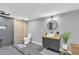 Modern bathroom features a floating vanity and a large glass-enclosed shower at 1945 Kevin Se Dr, Conyers, GA 30013