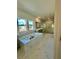 Elegant bathroom featuring a soaking tub, glass-enclosed shower, and marble flooring at 2455 Bleckley Pl, Cumming, GA 30041