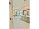 Bright bathroom features a soaking tub, double vanity, and sleek marble flooring at 2455 Bleckley Pl, Cumming, GA 30041