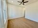 Bedroom featuring hardwood floors and modern trim at 2455 Bleckley Pl, Cumming, GA 30041