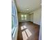 Sun-filled bedroom with hardwood floors and large windows with a view at 2455 Bleckley Pl, Cumming, GA 30041