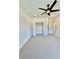 Bedroom featuring plush carpet, a ceiling fan, and a spacious closet at 2455 Bleckley Pl, Cumming, GA 30041