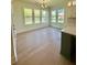 Bright dining area with large windows and natural light at 2455 Bleckley Pl, Cumming, GA 30041