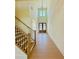 Grand entryway with soaring ceilings, hardwood floors, and a staircase with iron railings at 2455 Bleckley Pl, Cumming, GA 30041