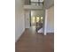 Bright and airy foyer with hardwood floors, staircase, and clear view of the home's layout at 2455 Bleckley Pl, Cumming, GA 30041