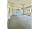 Empty two car garage with windows at 2455 Bleckley Pl, Cumming, GA 30041