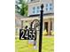 Address Sign showing '2455' in front of a charming home at 2455 Bleckley Pl, Cumming, GA 30041