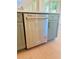 New KitchenAid stainless steel dishwasher with custom kitchen cabinetry at 2455 Bleckley Pl, Cumming, GA 30041