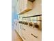 Gourmet kitchen boasts stainless steel appliances and custom cabinetry at 2455 Bleckley Pl, Cumming, GA 30041