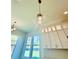 Modern kitchen showcasing stylish cabinets, contemporary lighting and ample natural light at 2455 Bleckley Pl, Cumming, GA 30041