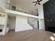This great room features hardwood floors, fireplace and a second-floor balcony overlooking the room at 2455 Bleckley Pl, Cumming, GA 30041