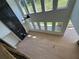 Bright living room features hardwood floors, fireplace and an abundance of natural light from numerous windows at 2455 Bleckley Pl, Cumming, GA 30041