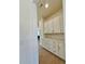 Walk-in pantry features custom shelves and ample storage space at 2455 Bleckley Pl, Cumming, GA 30041
