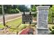 Community sign surrounded by landscaping and flowers at 2455 Bleckley Pl, Cumming, GA 30041