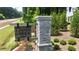 Cross Creek Crest community entrance sign with stone pillar and lush landscaping at 2455 Bleckley Pl, Cumming, GA 30041