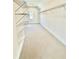 Spacious walk-in closet with metal shelving units for ample storage at 2455 Bleckley Pl, Cumming, GA 30041