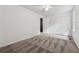 A spacious bedroom with new carpet, a ceiling fan, and access to a large double door closet at 2780 Northwood Court Sw Ct, Marietta, GA 30060