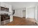 Bright kitchen leading to other living spaces featuring new flooring and stainless appliances at 2780 Northwood Court Sw Ct, Marietta, GA 30060