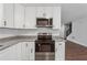 Modern kitchen with granite countertops and stainless steel appliances at 2780 Northwood Court Sw Ct, Marietta, GA 30060