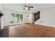 Bright living room featuring refinished floors, modern lighting, and an inviting atmosphere at 2780 Northwood Court Sw Ct, Marietta, GA 30060