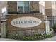 Attractive Villa Sonoma community sign with stone base and manicured landscaping at 10 Perimeter Summit Ne Blvd # 3105, Atlanta, GA 30319