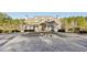 Charming clubhouse with stone accents and manicured landscaping in a beautiful, wooded community at 1056 Shadow Lake Dr, Lithonia, GA 30058