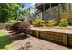 Backyard with two decks, wood fencing and landscaped garden at 1547 Grove Arbor Ter, Dacula, GA 30519