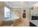 Bathroom featuring soaking tub, tiled shower, granite counters, and view to closet at 1547 Grove Arbor Ter, Dacula, GA 30519