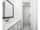 Clean bathroom features a single sink vanity and a private toilet and shower in an adjacent room at 280 W Knight W Rd, Mcdonough, GA 30252