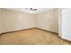 Minimalist bedroom features wood floors, a ceiling fan, and a closet door at 280 W Knight W Rd, Mcdonough, GA 30252