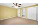 Bedroom featuring neutral paint, a ceiling fan, and a built-in niche at 280 W Knight W Rd, Mcdonough, GA 30252
