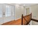 Inviting entryway with a wood floor, sidelight windows, and a stairway to the right at 280 W Knight W Rd, Mcdonough, GA 30252