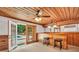 Recreation room featuring a bar, bar stools, and French doors leading to the backyard at 280 W Knight W Rd, Mcdonough, GA 30252