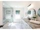Modern bathroom features a glass-enclosed shower, granite countertops, sleek fixtures, and natural light at 932 Brian Ln, Forest Park, GA 30297
