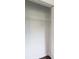 This closet has white walls, wire shelving for storage, and wood-look flooring, all ready for your belongings at 932 Brian Ln, Forest Park, GA 30297