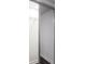 Mirrored closet door features wire shelving and closet pole for hanging clothes and storing belongings at 932 Brian Ln, Forest Park, GA 30297